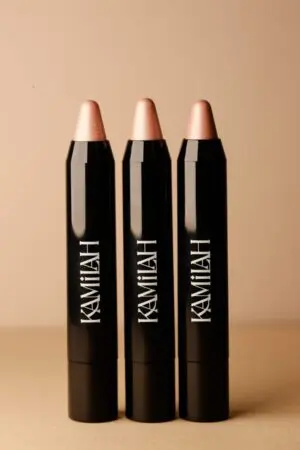 Three tubes of lipstick with a white logo on them.